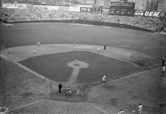 DiMaggio runs to 1B after long clout that Gionfriddo snagged.